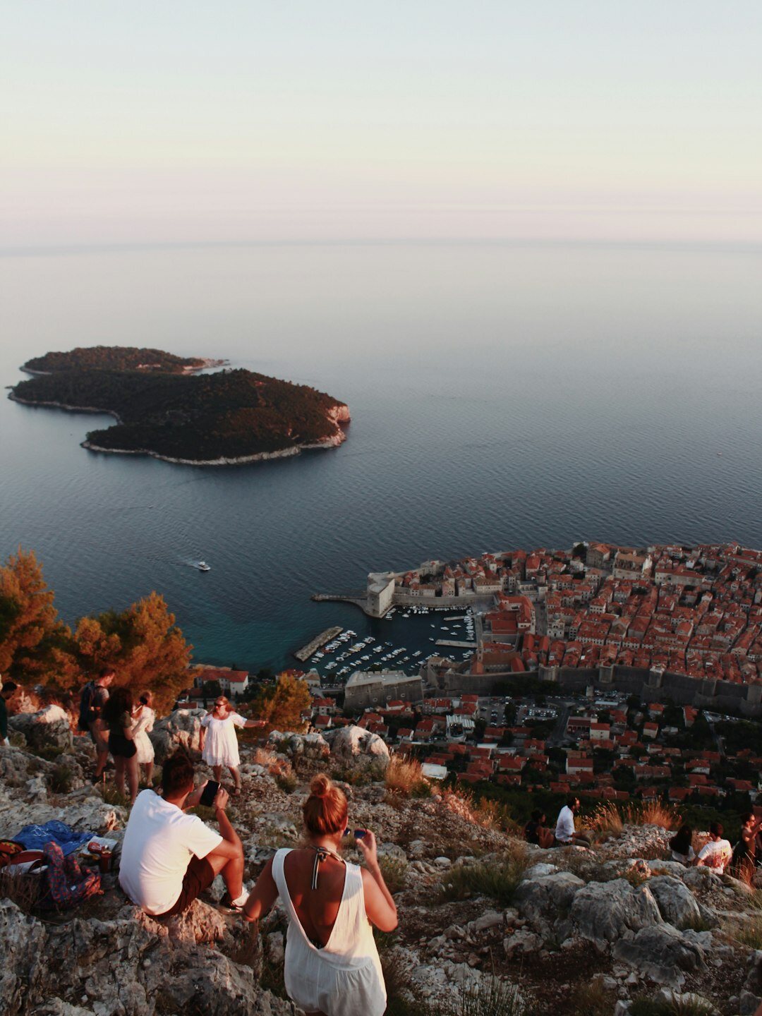 Seniors admiring a scenic viewpoint in Croatia